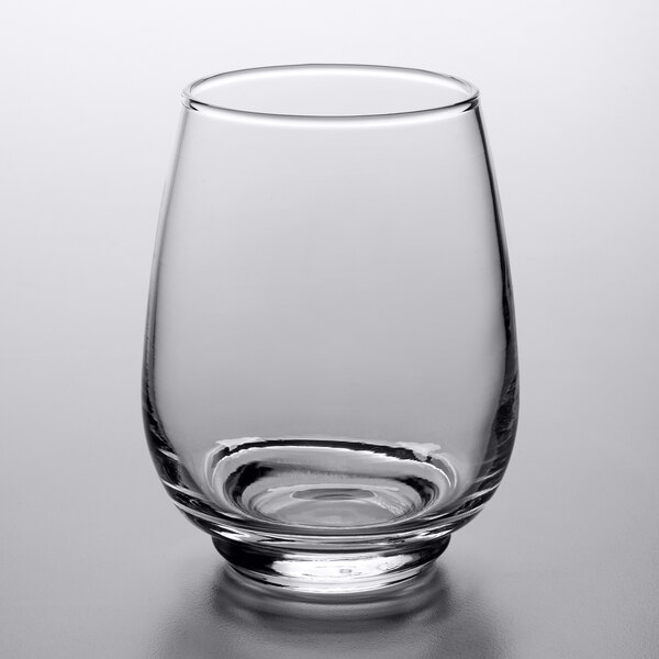 A clear, rounded 12 oz. stackable beverage glass.