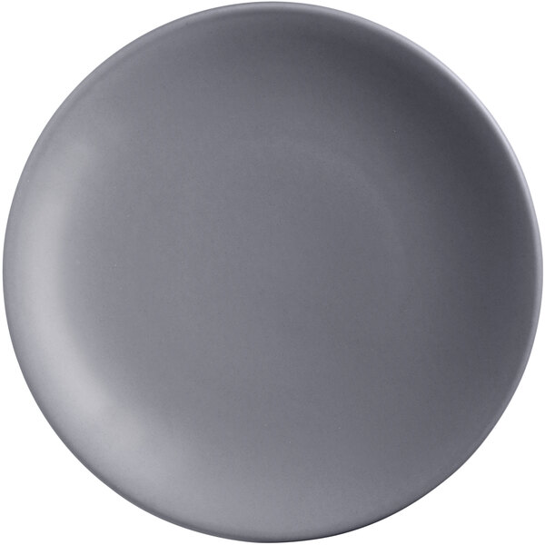 A round, granite-colored satin matte porcelain coupe plate.