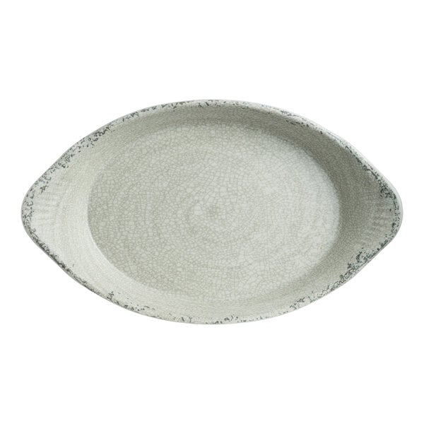 An oval stone melamine dish with small handles on each end.