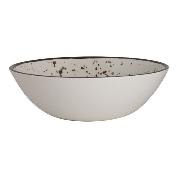 A white melamine round coupe bowl with a speckled interior design.