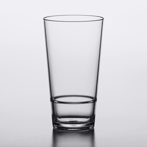 A clear, stackable 20 oz. plastic mixing glass.