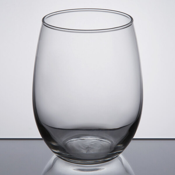 A clear 15 oz. stemless wine glass.