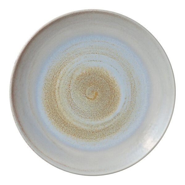 A round porcelain coupe plate with a light blue and beige swirl pattern.