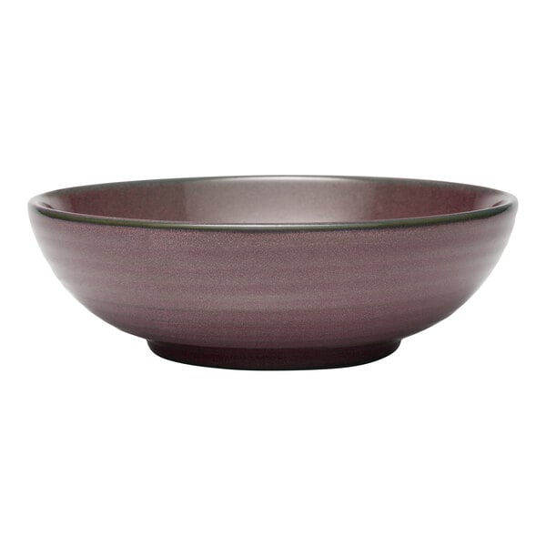 A mauve terracotta salad bowl with a smooth, rounded design.
