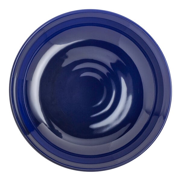 A round, deep blue melamine plate.