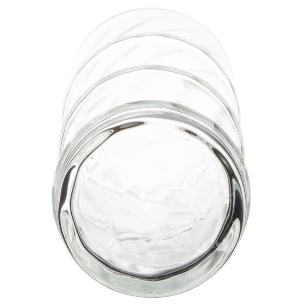 A clear 16 oz. specialty cooler glass viewed from above.