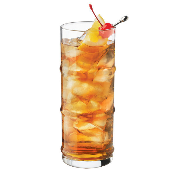 A 16 oz. specialty cooler glass filled with an iced beverage and garnished with a cherry and lemon slice.