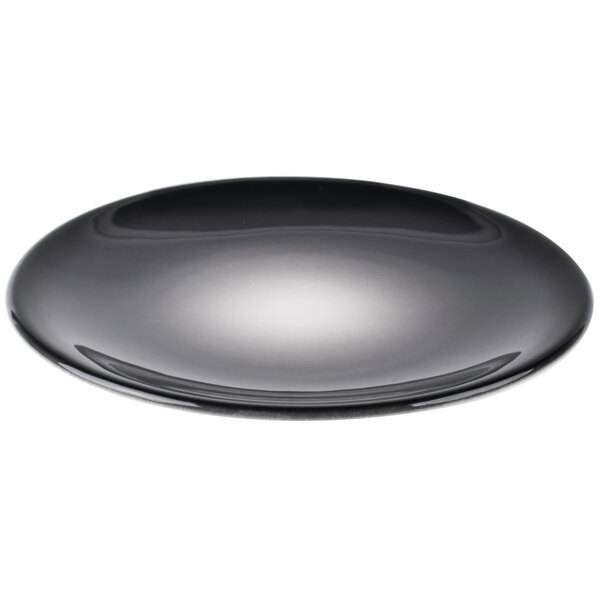 A black porcelain coupe plate with a smooth, glossy finish.
