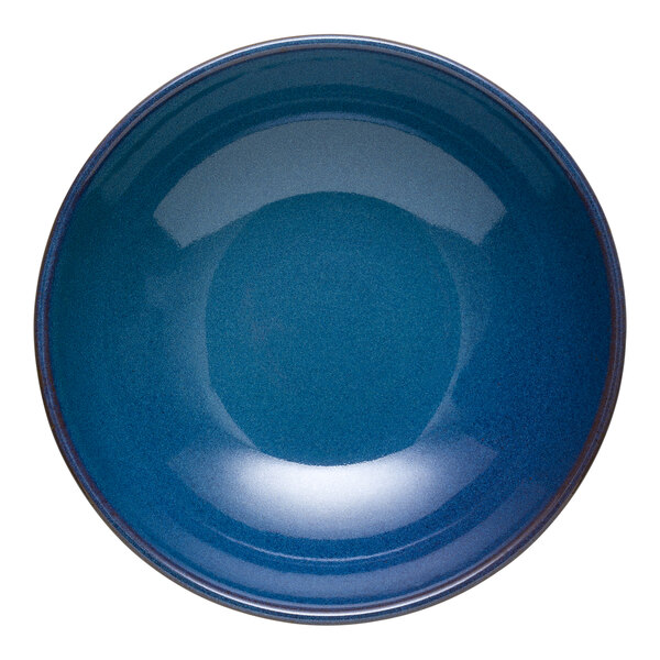 A blue terracotta salad bowl with a glossy finish.