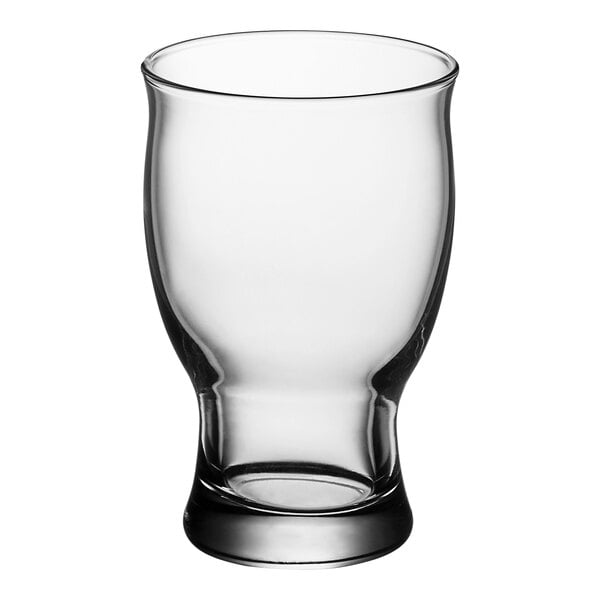 A clear, stackable 14.25 oz. craft beer glass with a rounded bowl and sturdy base.