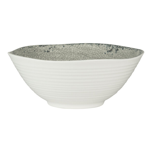 A white round melamine bowl with a textured gray interior pattern.