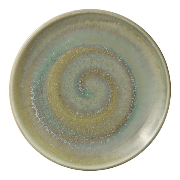A round porcelain coupe plate with a spiral pattern in earthy green and beige tones.