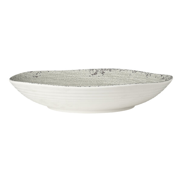 A round, shallow stone melamine bowl with a textured interior and smooth exterior.
