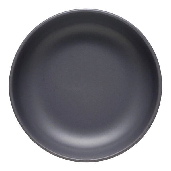 A matte granite-colored porcelain low bowl with a smooth finish.