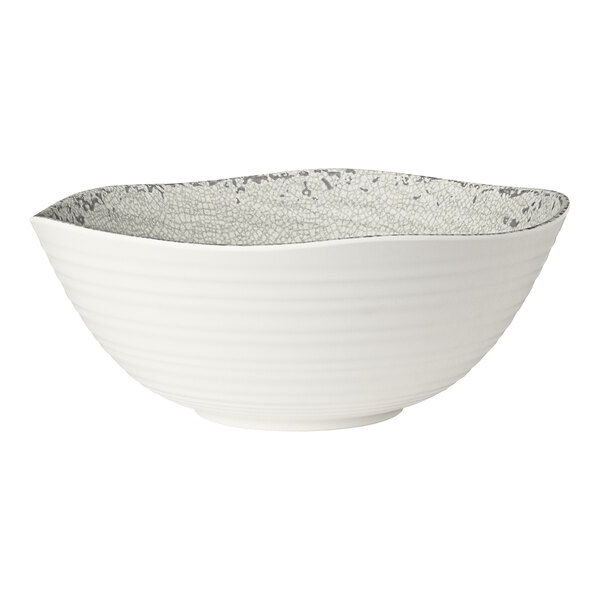 A white round melamine bowl with a textured gray interior pattern.