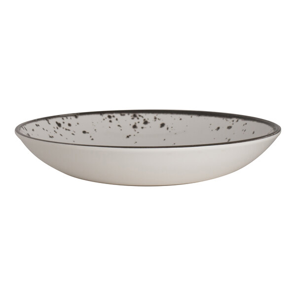 A round, shallow white melamine bowl with a speckled pattern and a dark rim.