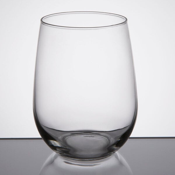 A clear, stemless white wine glass with a rounded bowl and a 17 oz. capacity.