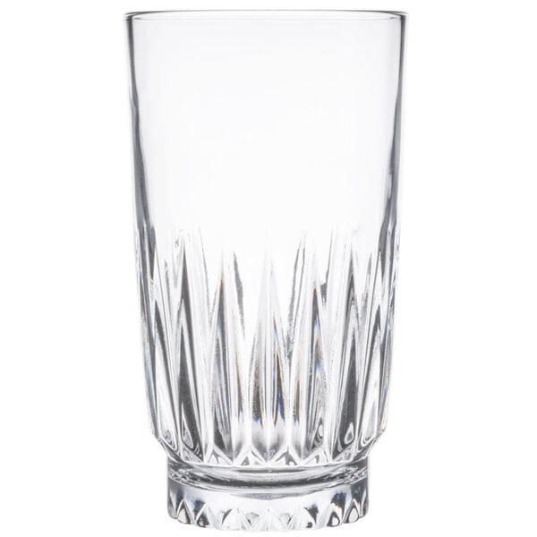 A clear 16 oz. cooler glass with a textured, faceted design near the base.