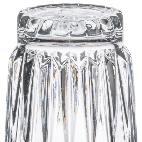 A clear, faceted 16 oz. cooler glass turned upside down.