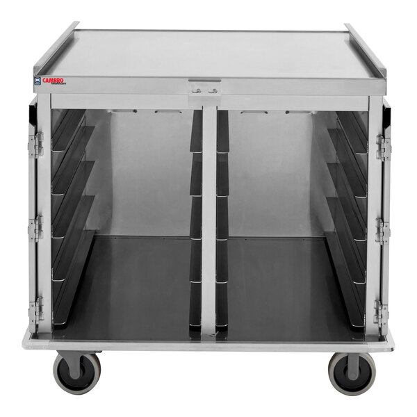 A stainless steel meal delivery cart with multiple tray slots and four wheels, designed to hold 20 trays sized 15" x 20".