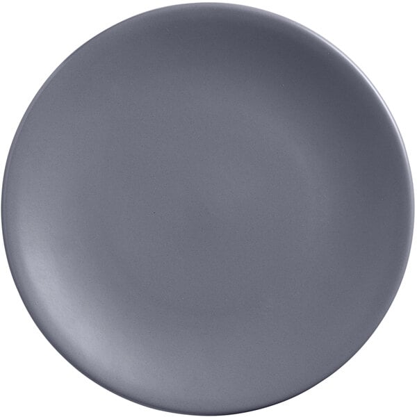 A round, granite-colored satin matte porcelain coupe plate.