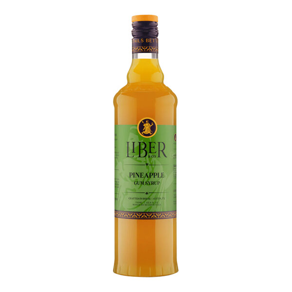 A 750 mL bottle of Liber & Co Pineapple Gum Syrup.