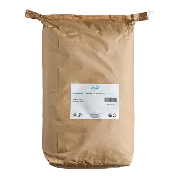 A large brown paper bag labeled as Marx Brothers Embe Organic Coconut Sugar, weighing 55 pounds.