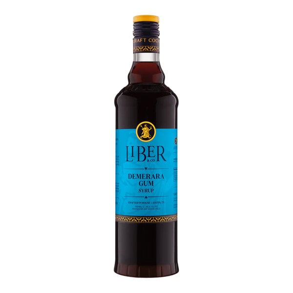 A 750 mL bottle of Liber & Co Demerara Gum Syrup with a blue label.