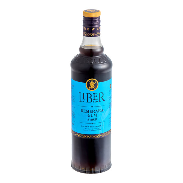 A 750 mL bottle of Liber & Co Demerara Gum Syrup with a blue label.