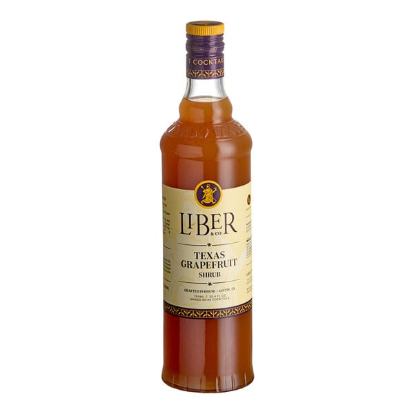 A 750 mL bottle of Liber & Co Texas Grapefruit Shrub.