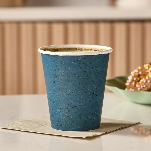 Choice 10 oz. Single Wall Blue Speck Print Poly Paper Hot Cup - 1,000/Case