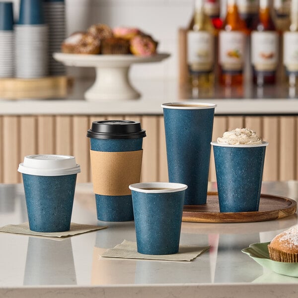 Choice 10 oz. Single Wall Blue Speck Print Poly Paper Hot Cup - 1,000/Case