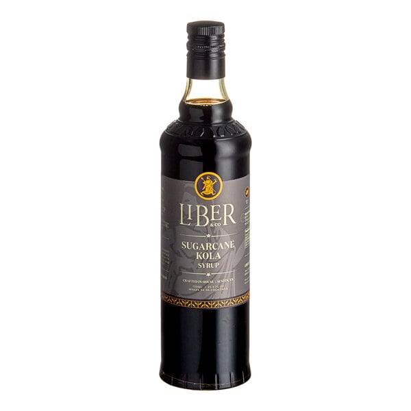 A 750 mL bottle of Liber & Co Sugarcane Kola Syrup.