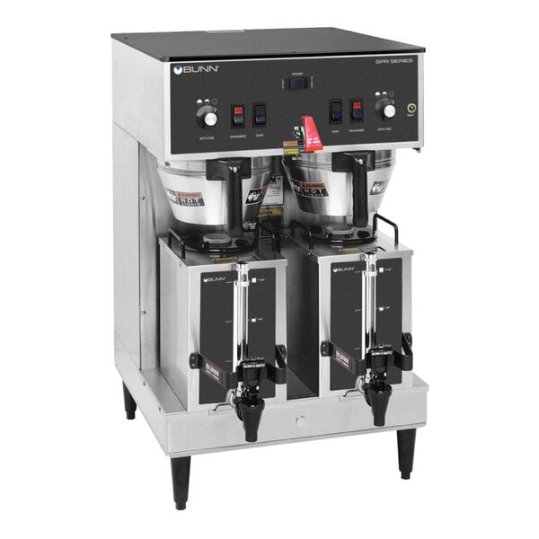 A commercial dual coffee brewer with two dispensers and control panel, designed for high-volume brewing.