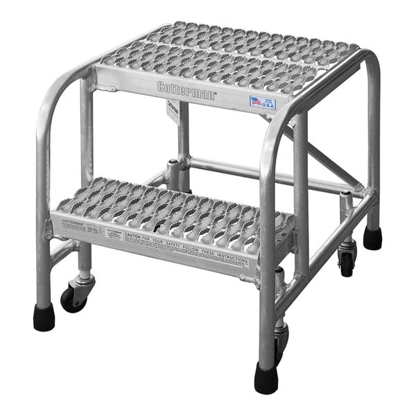 A two-step welded aluminum rolling ladder with serrated tread and a 350 lb. capacity.