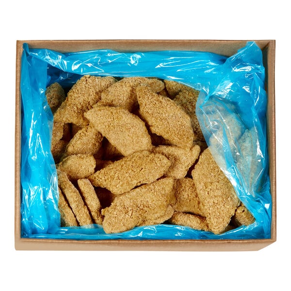 A box of frozen MorningStar Farms Vegan Chik'n Tenders in a blue plastic liner.