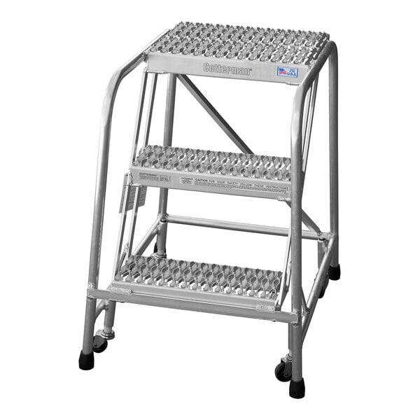 A three-step welded aluminum rolling ladder with serrated tread and a 350 lb. capacity.
