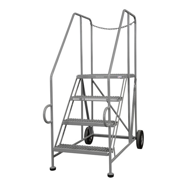 A gray powder-coated steel 3-step trailer access platform with handrails and wheels.