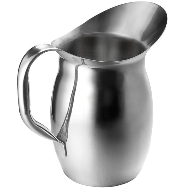 A stainless steel bell pitcher with a handle and a wide spout.