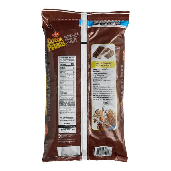 The image shows the back of a brown bag of Cocoa Pebbles cereal with nutrition facts, a recipe for cereal treats, and cartoon characters near the bottom.