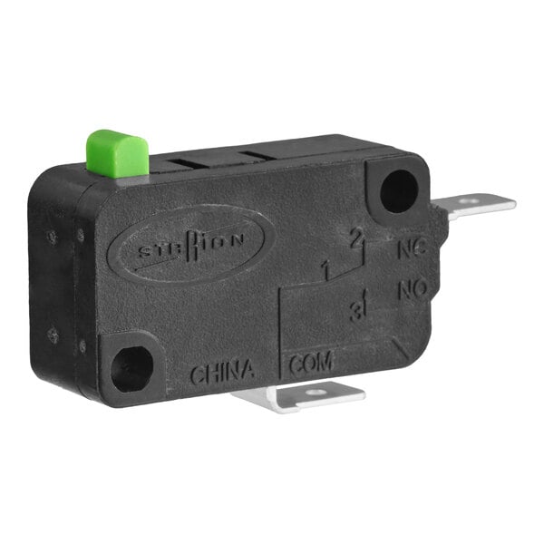 A black microswitch with a green button and metal terminals, designed for use in commercial microwaves.