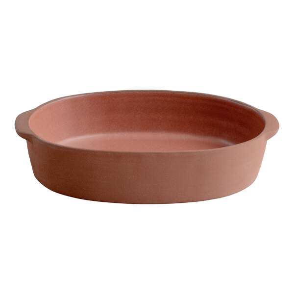 A sienna-colored high rim oval stoneware baker with handles.