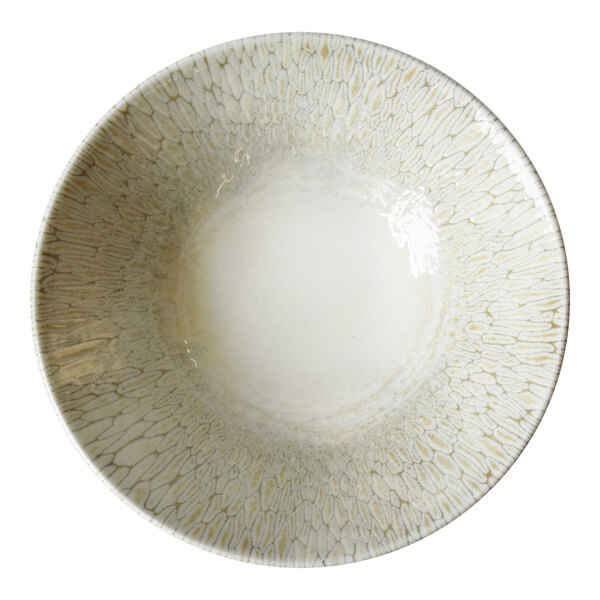 A beige china coupe bowl with a textured pattern on the interior.