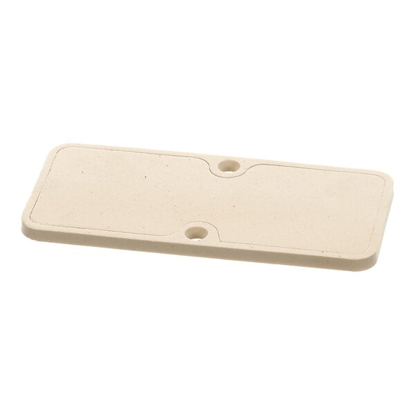 A rectangular beige water reservoir seal with two holes, designed for use in Follett Corporation equipment.