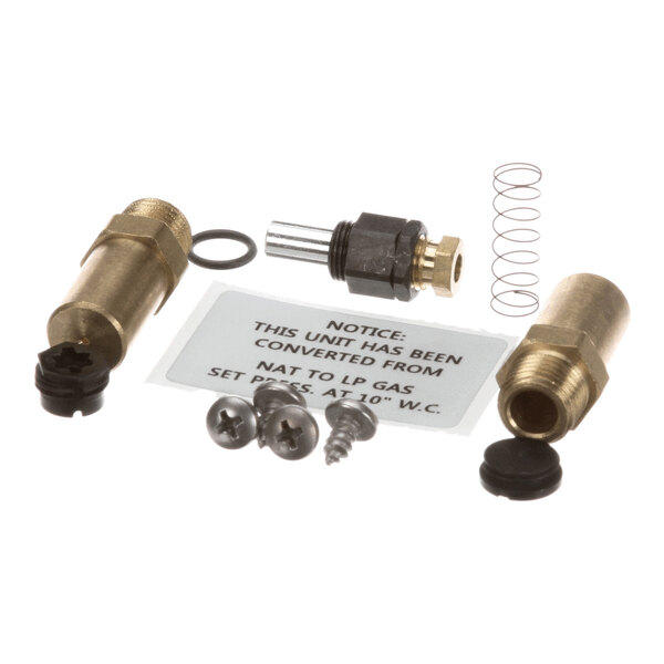 A Blodgett 30397 conversion kit for converting natural gas to liquid propane, including brass fittings, screws, a spring, and a notice label.