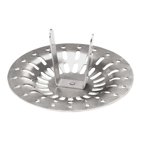 A round metal drain cover with multiple holes and a raised central handle.