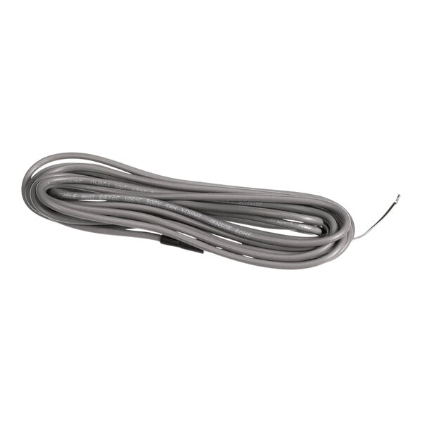 A coiled gray sensor wire for refrigeration equipment.