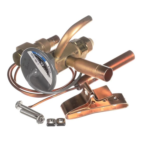 A brass and copper thermostatic expansion valve assembly with attached capillary tube, mounting clip, and hardware.