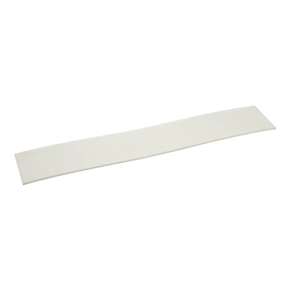 A long, rectangular white wicking pad for refrigeration units.