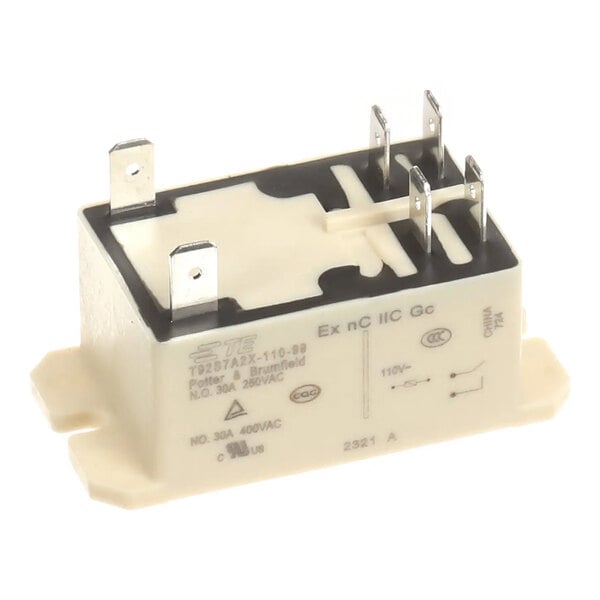 A rectangular power relay with multiple metal prongs and labeled specifications on the side.
